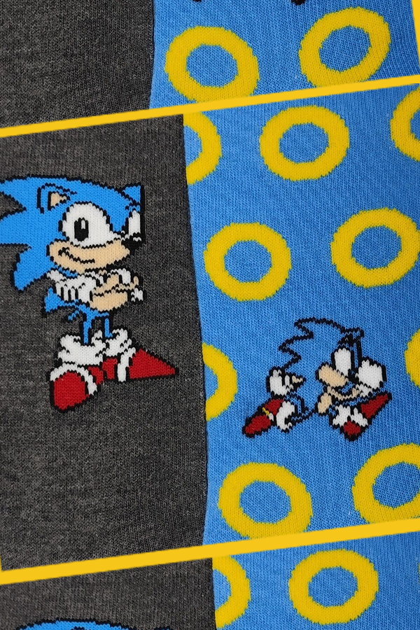 Two pairs of socks with Sonic the Hedgehog design on a checkered background