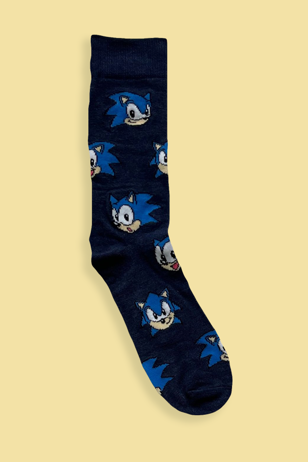 Navy blue sock with cartoon character pattern on a beige background