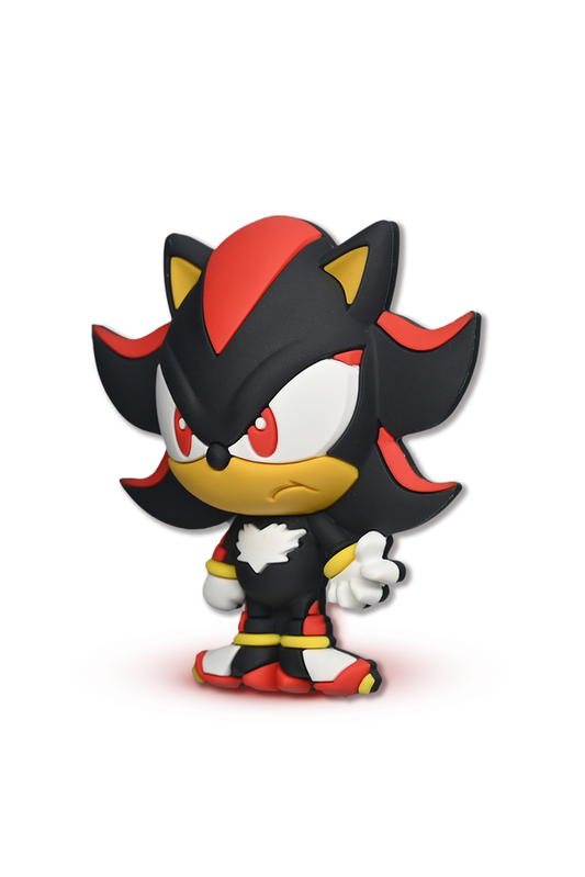Toy figure of a character with black, red, and white colors on a white background